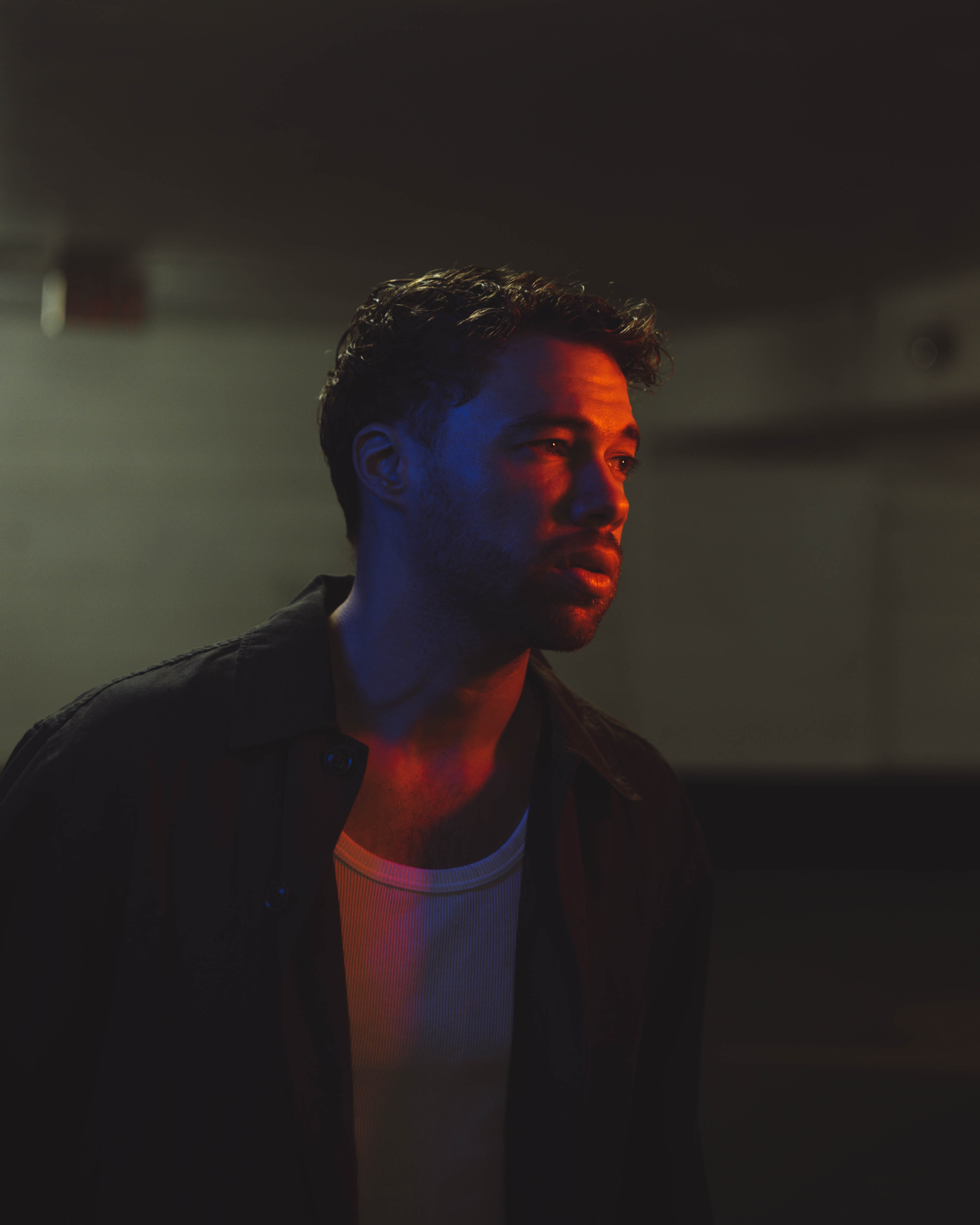 Kill Them With Colour lit in blue and red